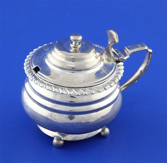 A George IV silver mustard pot, height 3in.